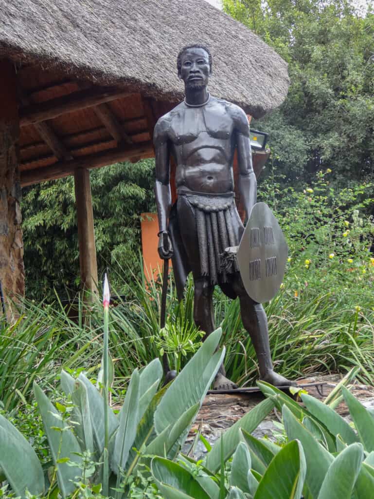Zulu statue in the gardens at Misty Hills